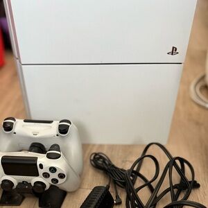 Sony PS4 and two controllers